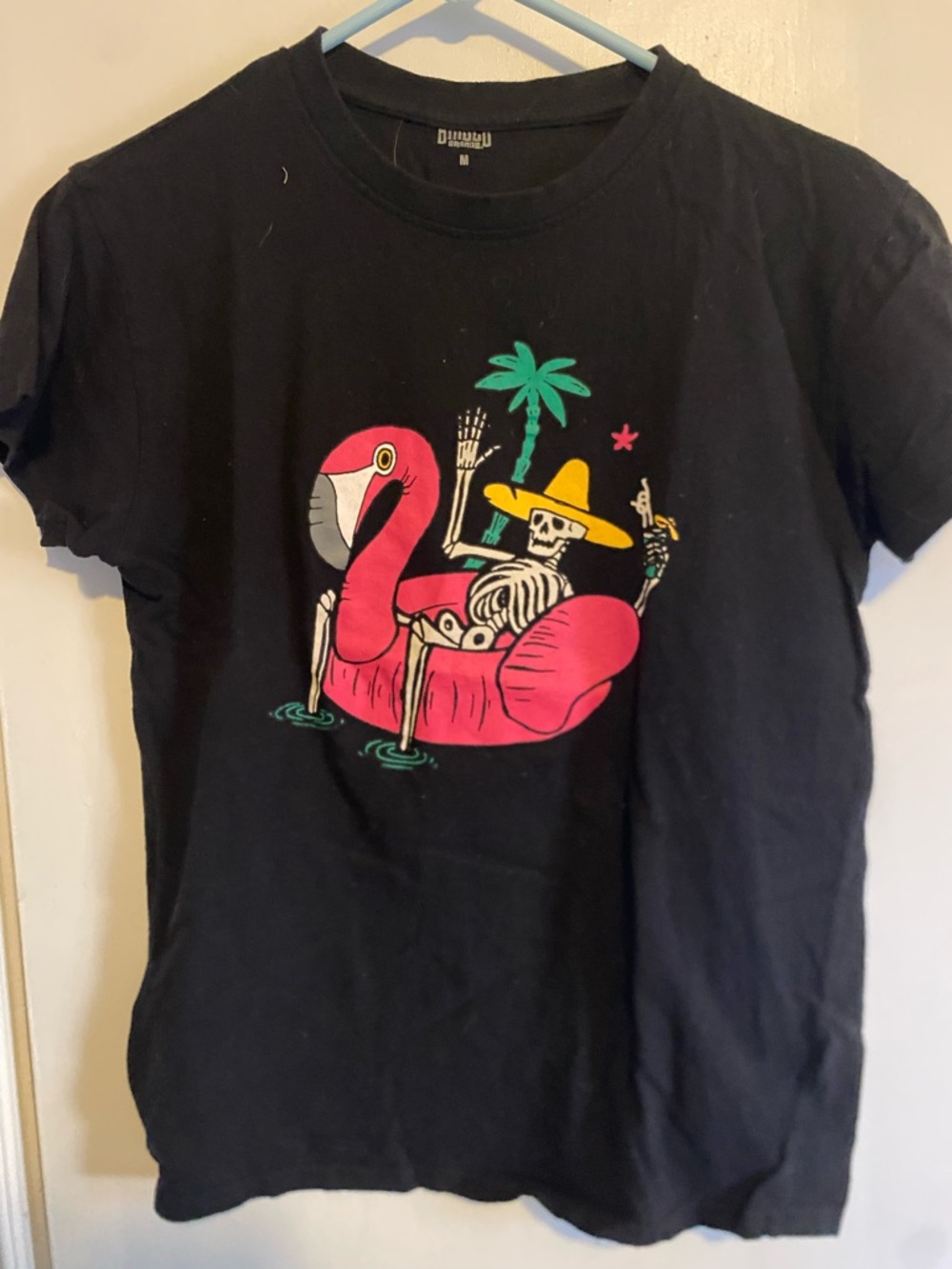Skeleton on Pink Flamingo Inflatable Graphic Tee